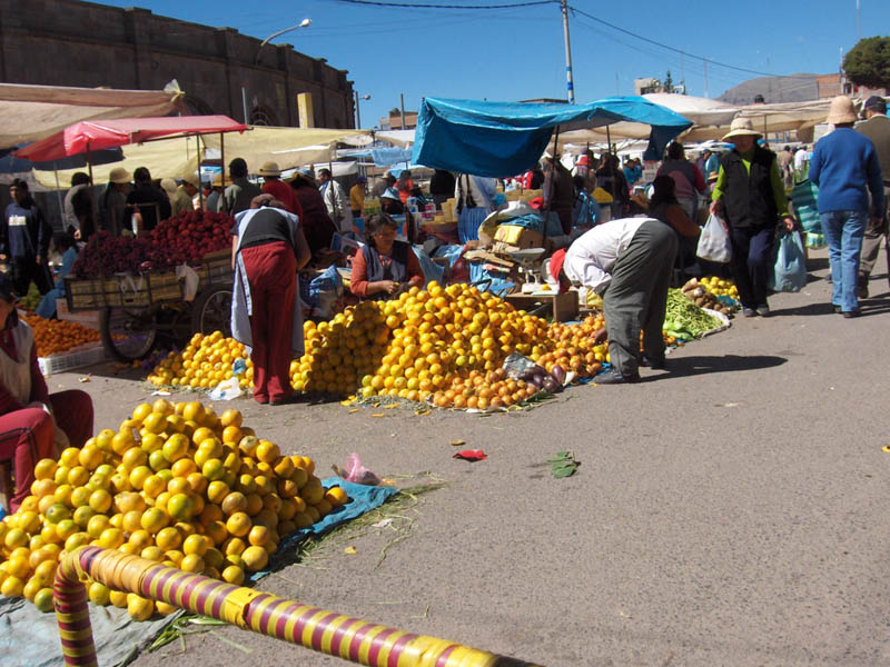 It is fun to visit the market and see the Inca's in the middle of huge piles of fruit