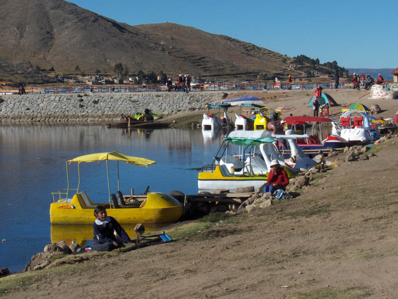Pedal boats in a pond off lake Titiqaqa