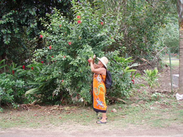Sharon Grabing a flower